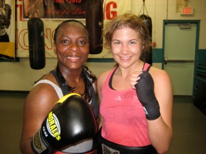 Bad News Brown after a sparring session with newcomer Canadian flyweight Amanda Beaudin.